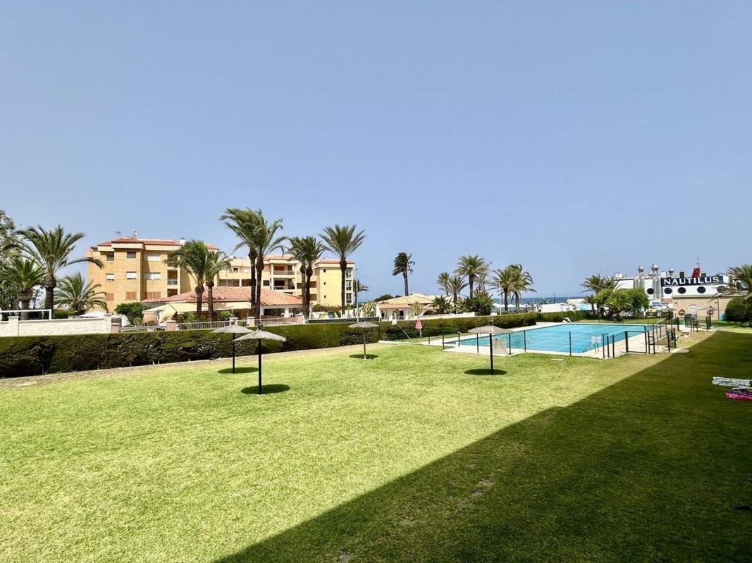 property-565397-3-medium Piso en Punta Prima, Orihuela