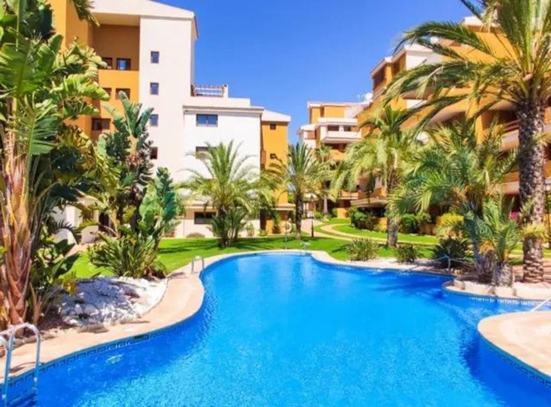property-586999-1-medium Piso en Avenida de las Olas s/n, Punta Prima, Torrevieja